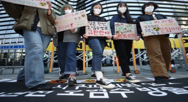 Çin-Japon yöneticiler, okyanusa dökmeden önce nükleer atık suyu içsin